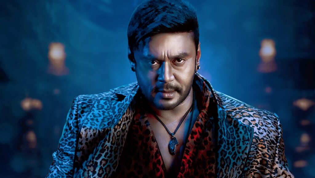 Challenjing Star Darshan: ಕಂಬಿ ಹಿಂದೆ ಕಾಡುತ್ತಿದ್ದಾನೆ ರೇಣುಕಾಸ್ವಾಮಿ! 1 » cinishodha.com Darshan The Devil e1741450624150 1024x578 2 1